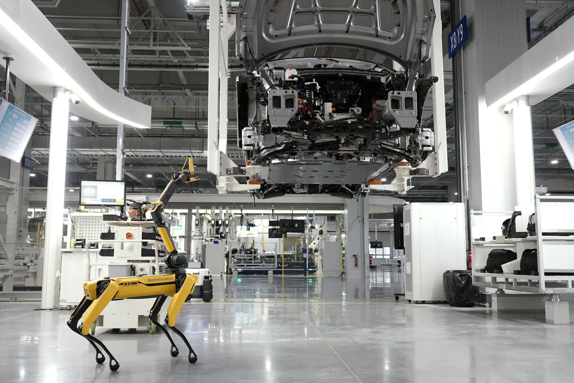 boston dynamics robot in a car factory