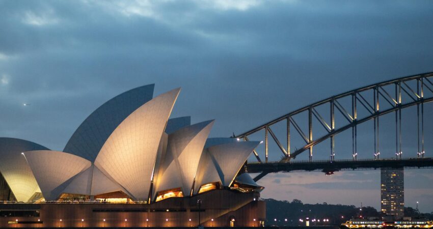 exterior of sydney opera house in late evening