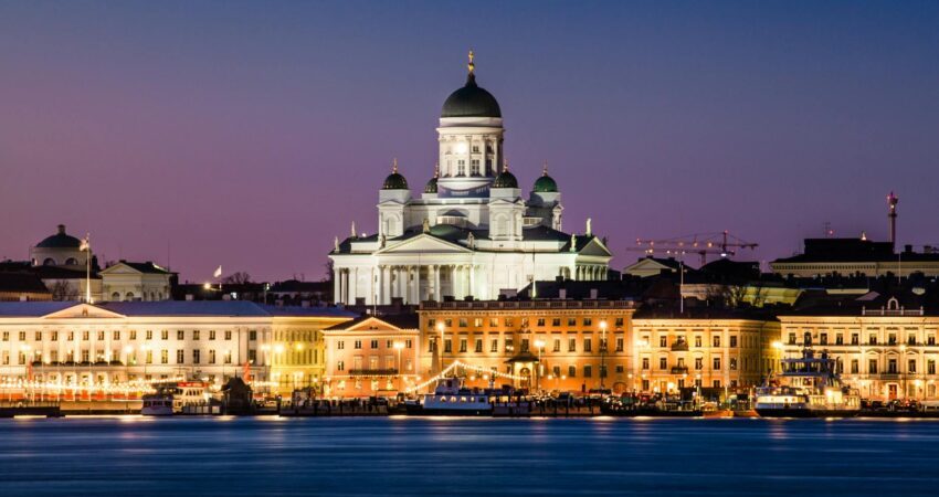 photo of cathedral near buildings and river